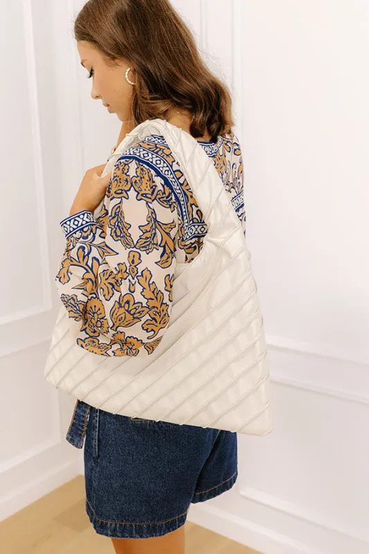 Allie Faux Leather Hobo Tote in Cream sold by Impressions