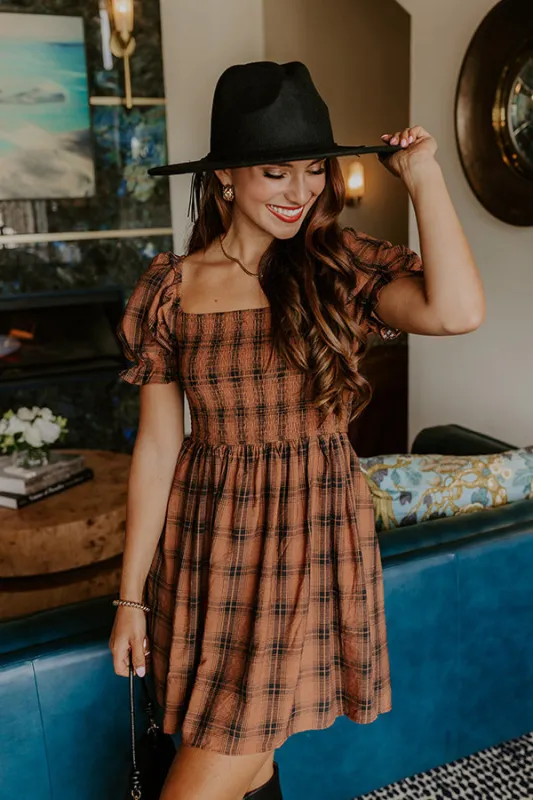 Cider Season Smocked Mini Dress in Cinnamon sold by Impressions