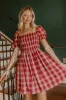 Cider Season Smocked Mini Dress in Wine sold by Impressions