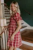 Cider Season Smocked Mini Dress in Wine sold by Impressions
