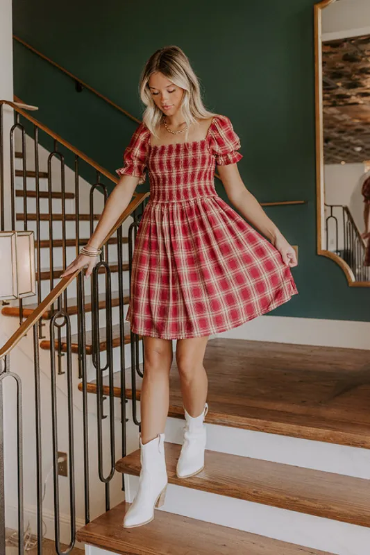 Cider Season Smocked Mini Dress in Wine sold by Impressions