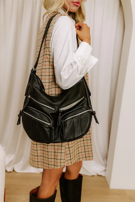 The Christine Faux Leather Hobo Tote in Black sold by Impressions