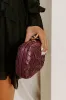 The Rya Faux Leather Woven Clutch in Windsor Wine sold by Impressions
