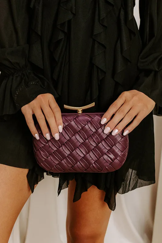 The Rya Faux Leather Woven Clutch in Windsor Wine sold by Impressions