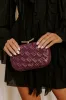 The Rya Faux Leather Woven Clutch in Windsor Wine sold by Impressions