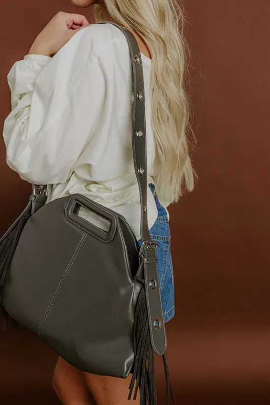 Metropolitan Muse Faux Leather Fringe Purse in Grey sold by Impressions