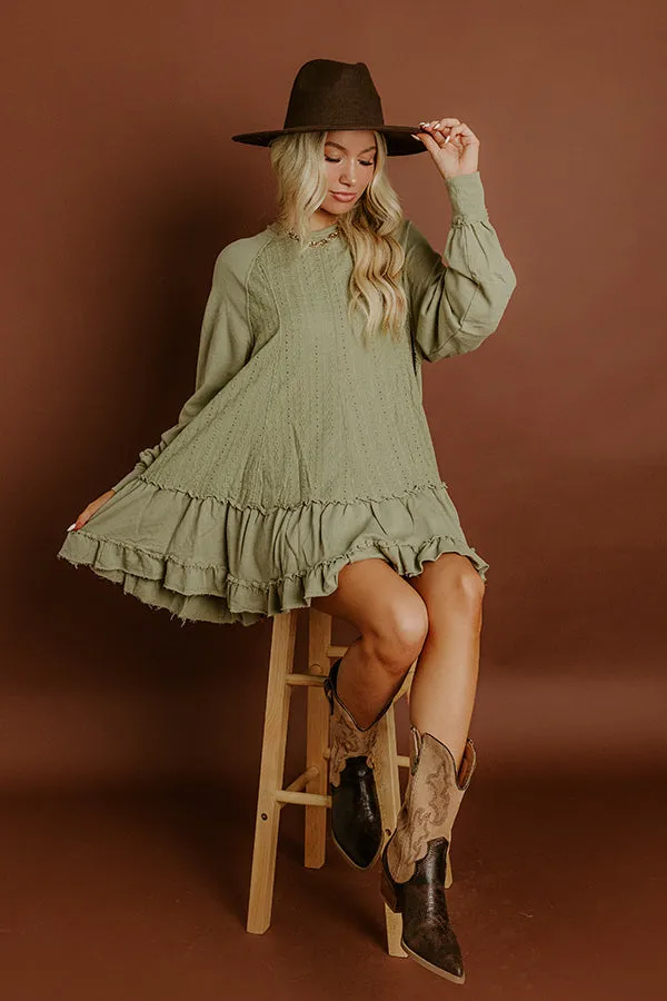 Kind Eyes Eyelet Mini Dress in Sage sold by Impressions