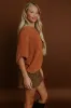 Pumpkin Spice Sippin Knit Top in Rust sold by Impressions