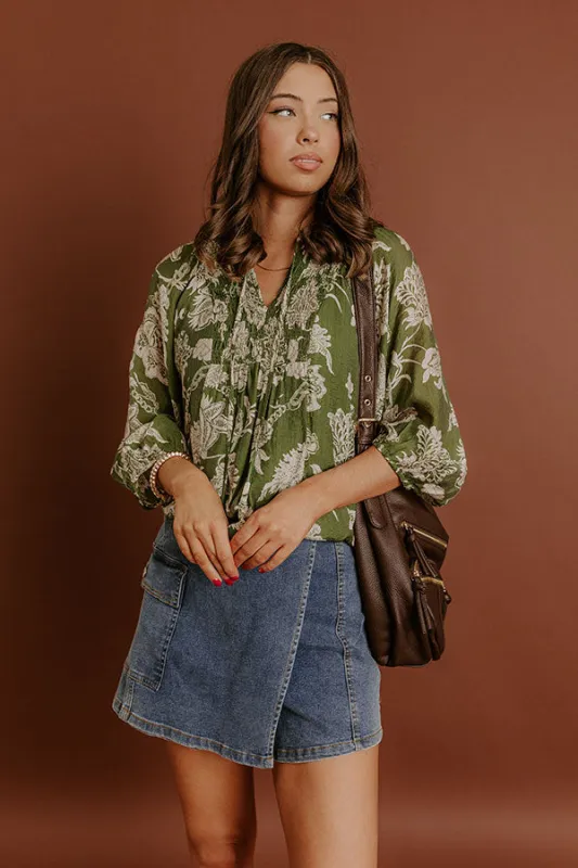 Simply Charming Floral Top in Olive sold by Impressions
