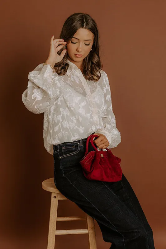 Modern Edge Floral Applique Button Up Top sold by Impressions