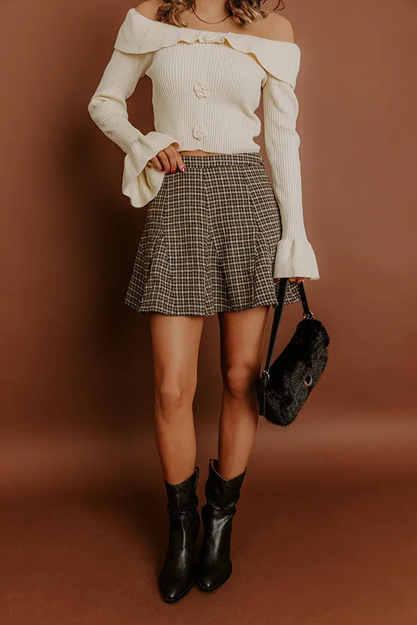 The Chloe High Waist Houndstooth Mini Skirt sold by Impressions product image thumbnail 4