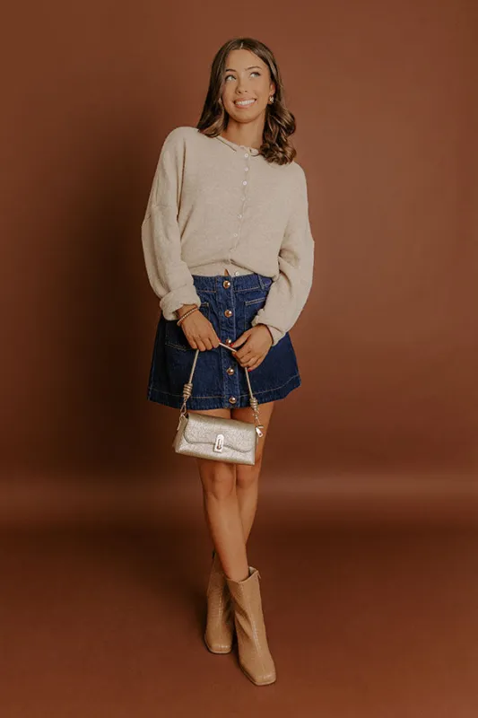 The Violet High Waist Denim Mini Skirt sold by Impressions