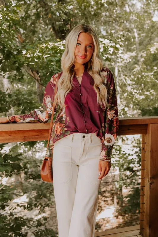 Uptown Poise Floral Top in Wine sold by Impressions