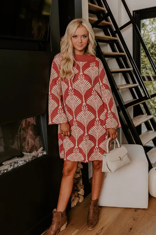 The Deco Dream Knit Mini Dress in Rust sold by Impressions