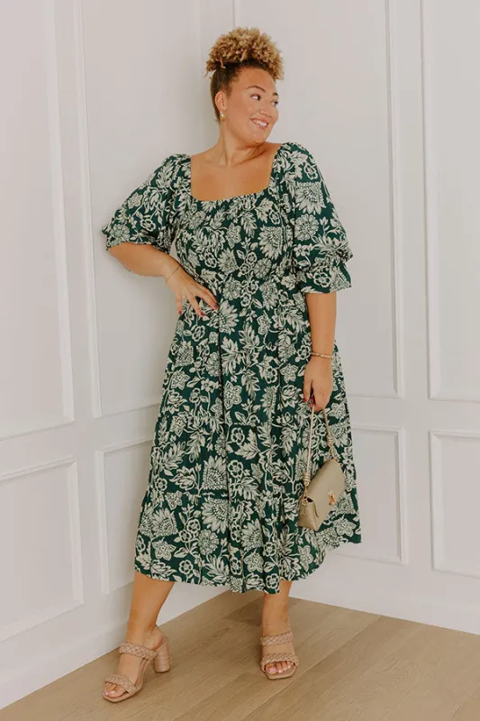 Mystic Garden Floral Smocked Midi Dress in Hunter Green Curves sold by Impressions