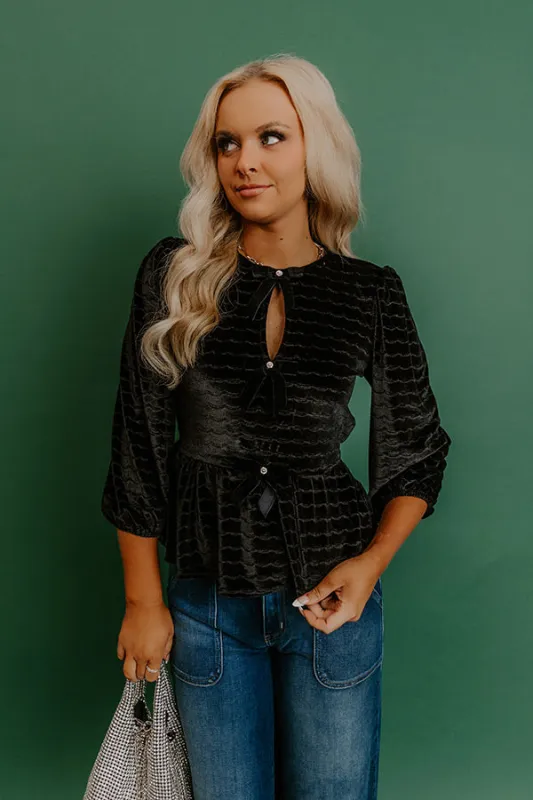 Uptown Edit Velvet Peplum Top in Black sold by Impressions