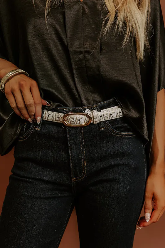 Uptown Muse Faux Leather Snake Print Belt in White sold by Impressions