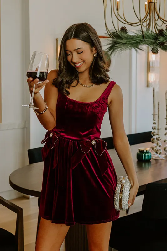 Twilight Toast Velvet Mini Dress in Merlot sold by Impressions