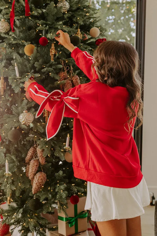 Sweet Surprise Bow Sweatshirt sold by Impressions