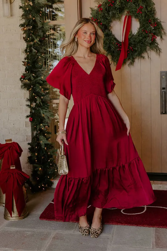 Storybook Charm Smocked Satin Midi Dress in Wine sold by Impressions