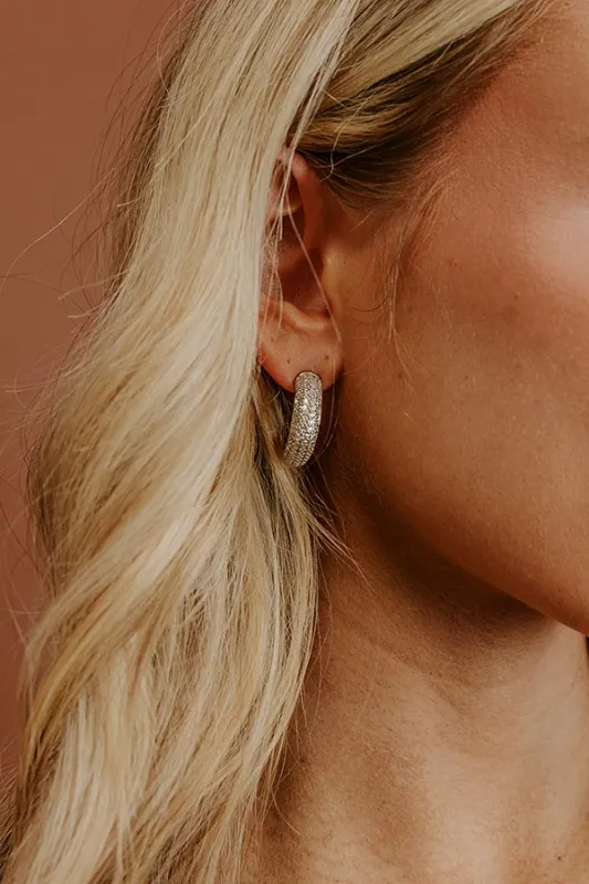 Glistening Smile Pave Hoop Earrings in Silver sold by Impressions