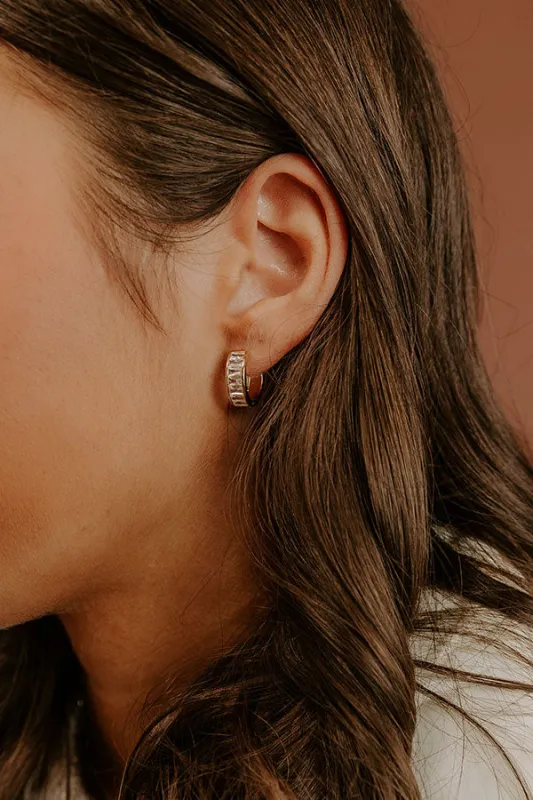 Glimmering Smile Baguette Huggie Hoop Earrings sold by Impressions