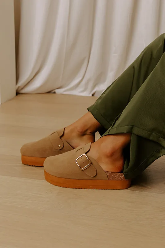 The Payton Faux Suede Platform Clogs in Camel sold by Impressions