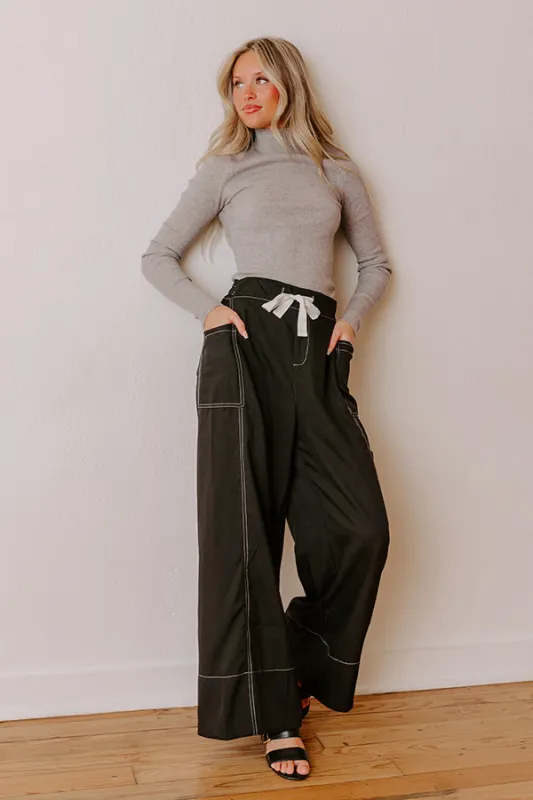 The Lily High Waist Wide Leg Pants in Black sold by Impressions
