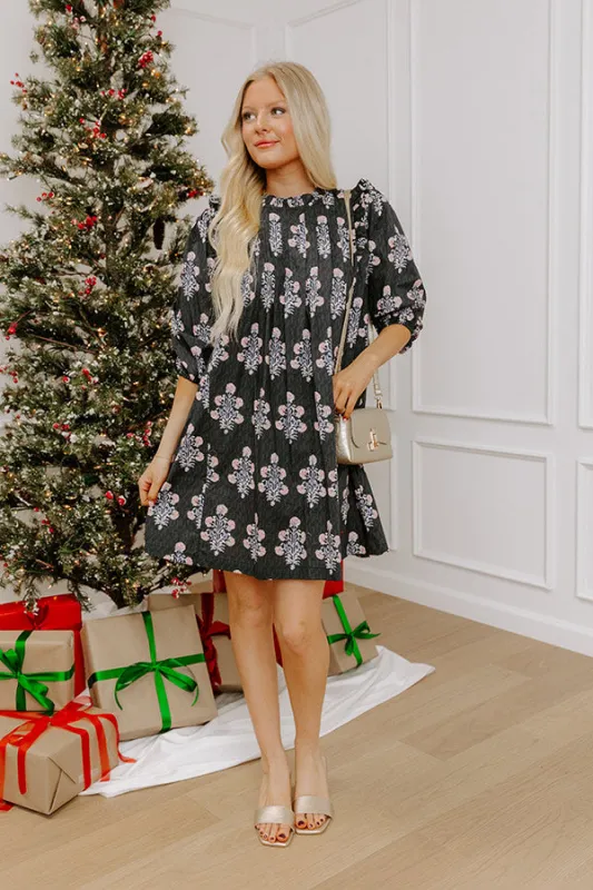 Floral Sonata Pleated Mini Dress in Black sold by Impressions