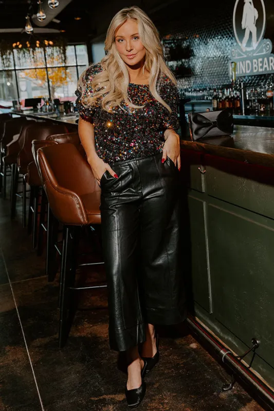 The Hazel High Waist Faux Leather Wide Leg Pants in Black sold by Impressions