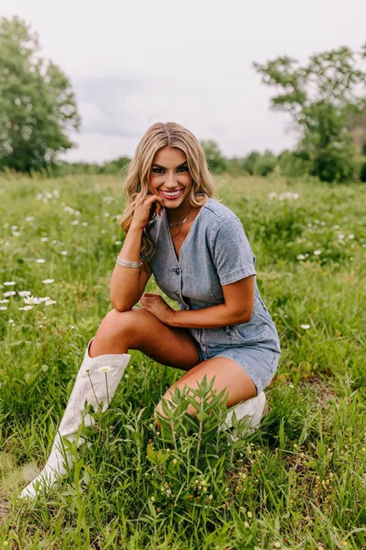 Manhattan Marvels Denim Romper in Medium Wash sold by Impressions