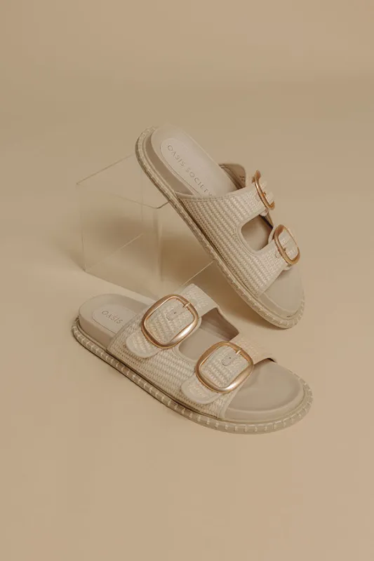 The Daytona Raffia Woven Sandal in Cream sold by Impressions