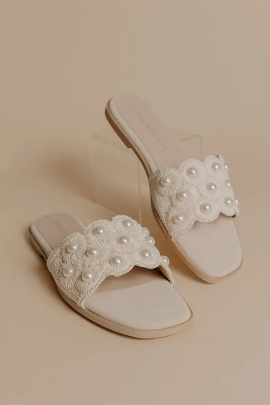 The Cathleen Raffia Woven Embellished Sandal in Ivory sold by Impressions