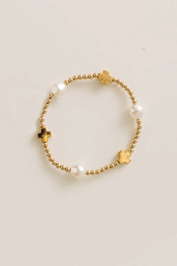 Enewton Signature Cross Gold and Admire Pearl 3mm Gold Bracelet sold by Impressions