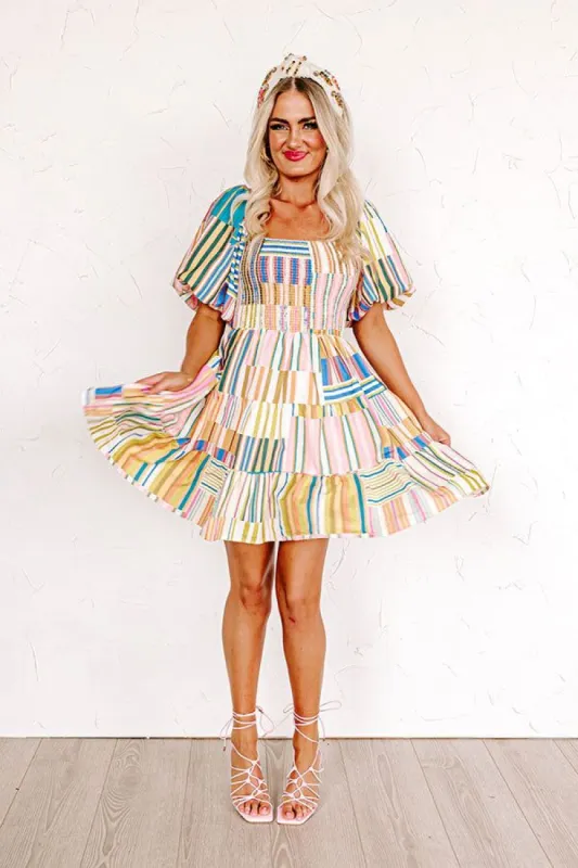 Flirty Fiesta Smocked Dress sold by Impressions