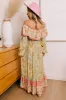 Blooming Meadow Floral Maxi in Pear sold by Impressions