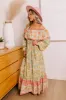 Blooming Meadow Floral Maxi in Pear sold by Impressions