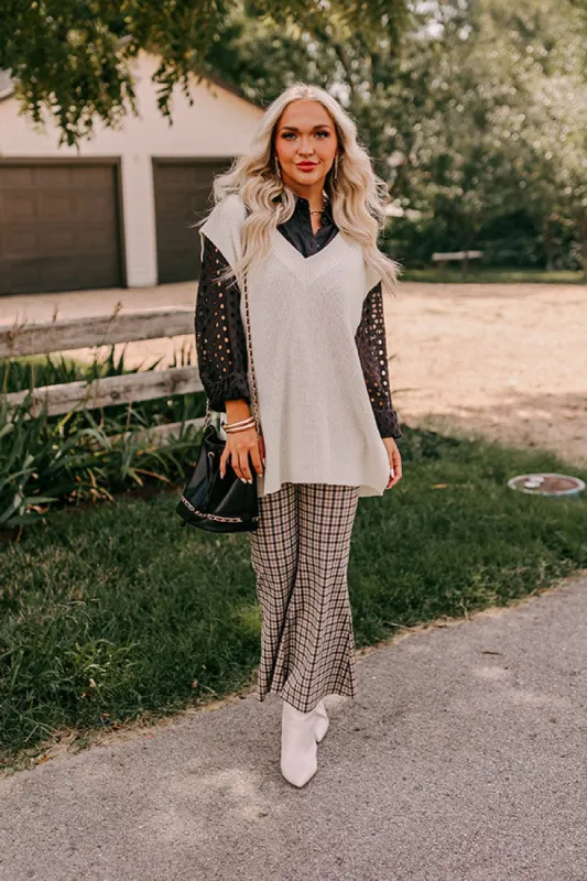 Popular Phrase Tunic Sweater Vest In Cream sold by Impressions