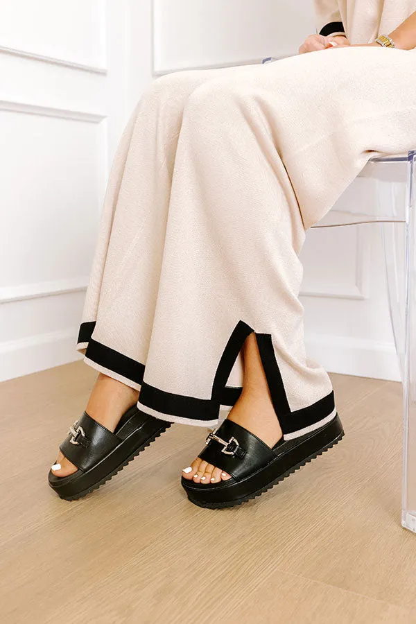 The Harper Faux Leather Sandal in Black sold by Impressions