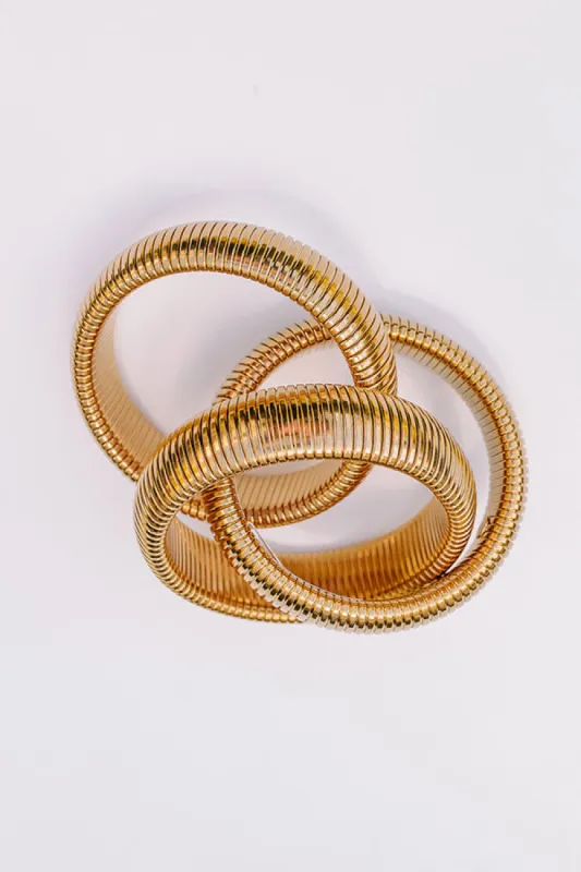 Large Gold Twisted Cobra Bangle Bracelets sold by Impressions