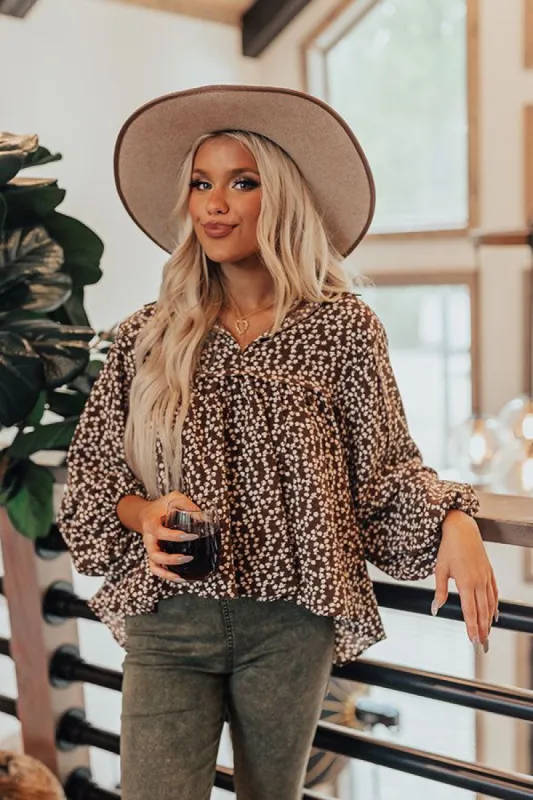 The Ivee Floral Babydoll Top in Chocolate sold by Impressions