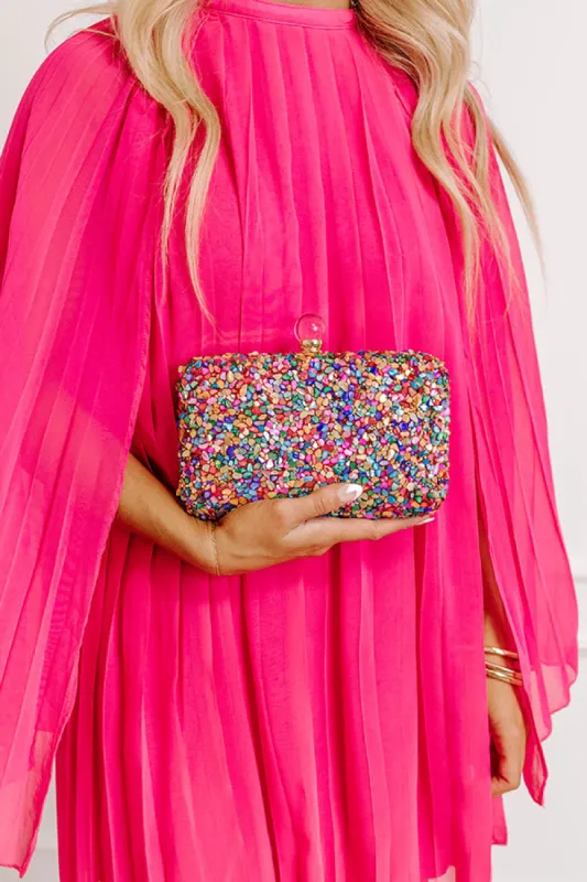 A Little Bit Flirty Clutch sold by Impressions
