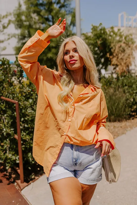 Sending Good Luck Button Up Top In Orange Curves sold by Impressions