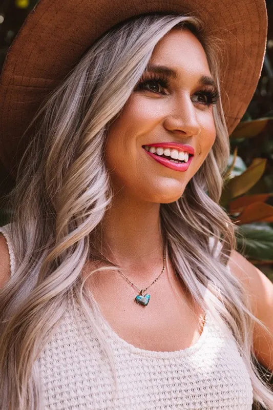 Poppy Heart Vintage Gold Pendant Necklace in Turquoise sold by Impressions