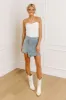 The Tilly Denim Mini Skirt in Light Wash sold by Impressions