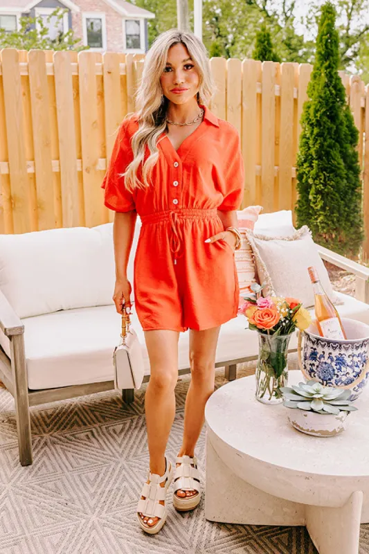 Colorful Coastline Romper in Tangerine sold by Impressions