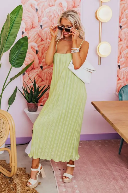 Tip Of Florida Pleated Midi In Lime Punch sold by Impressions