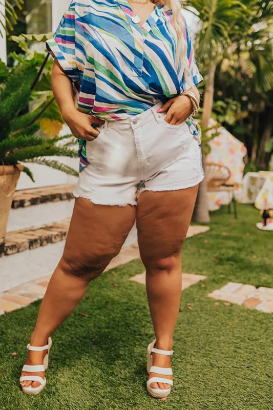The Darly High Waist Distressed Shorts Curves sold by Impressions