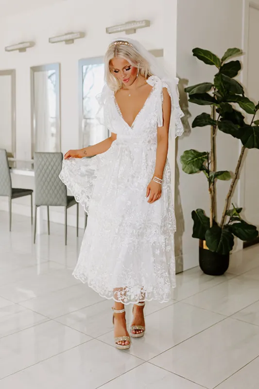 The Olivia Rose Embroidered Tiered Midi sold by Impressions