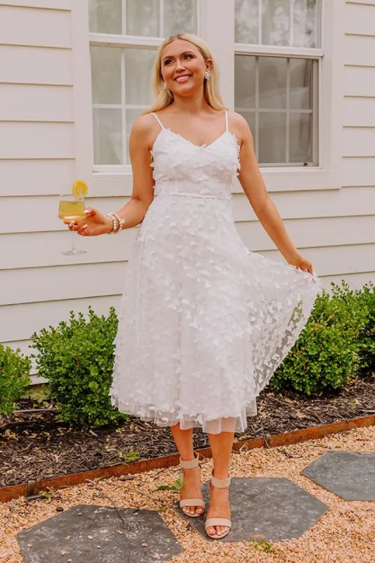 Garden Party Glow Midi in White sold by Impressions